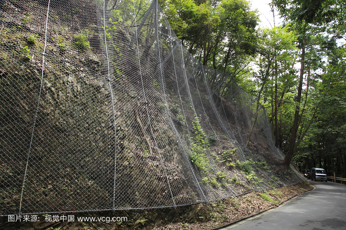 t wiring across the surface of a cliff, preventing 