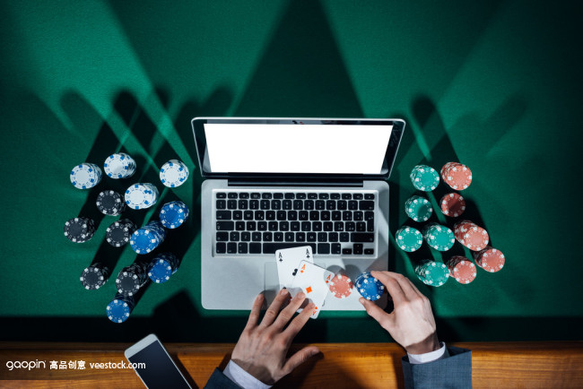 Man playing online poker Man playing online poker