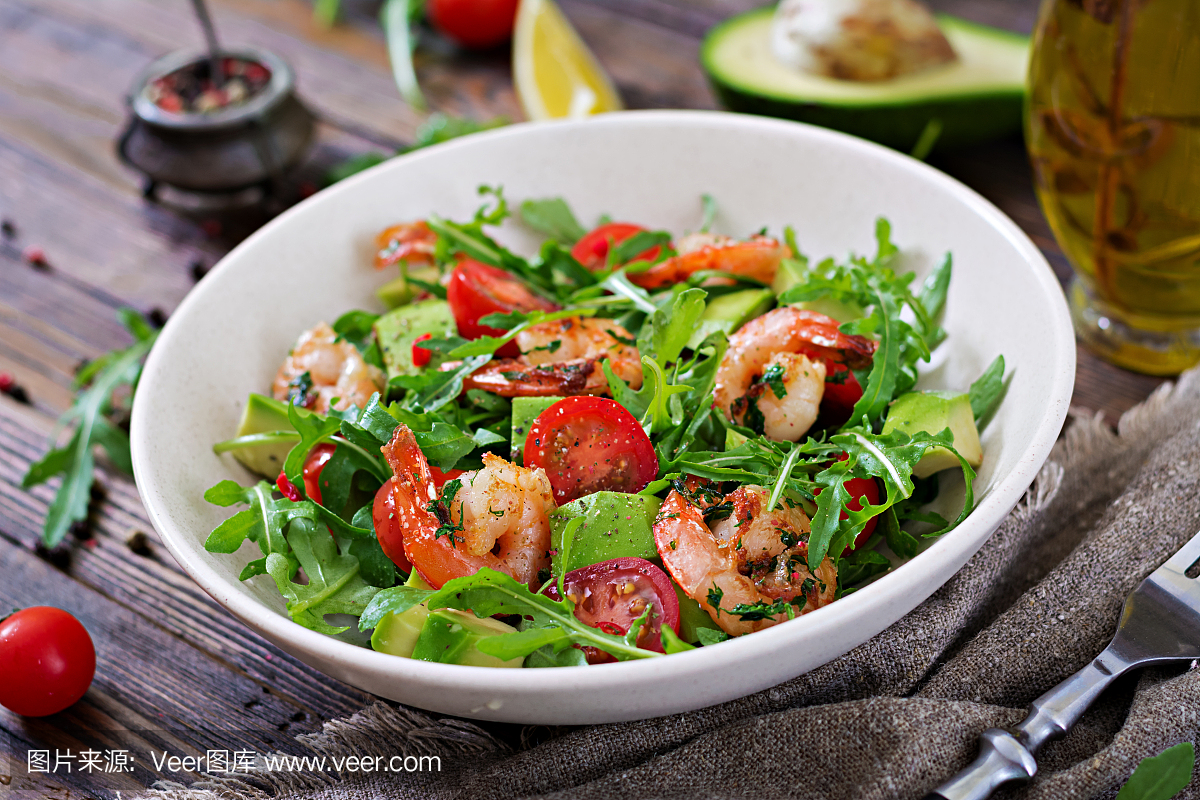 Fresh salad bowl with shrimp, tomato, avocado