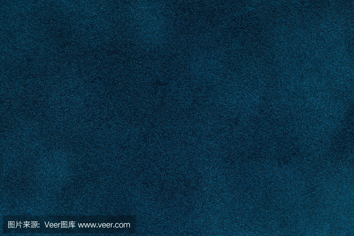 深蓝色麂皮绒织物特写的背景。海军蓝色磨砂纺