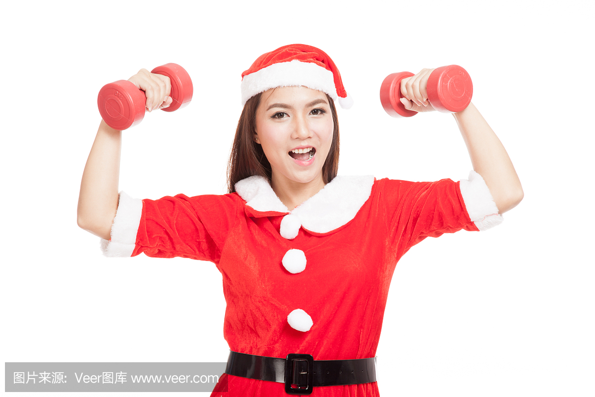 亚洲圣诞节女孩与圣诞老人的衣服和红色哑铃