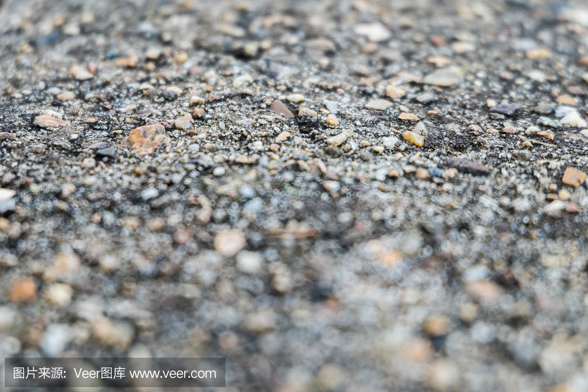 地板纹理与小石头和水泥的在显示焦点区域和迷