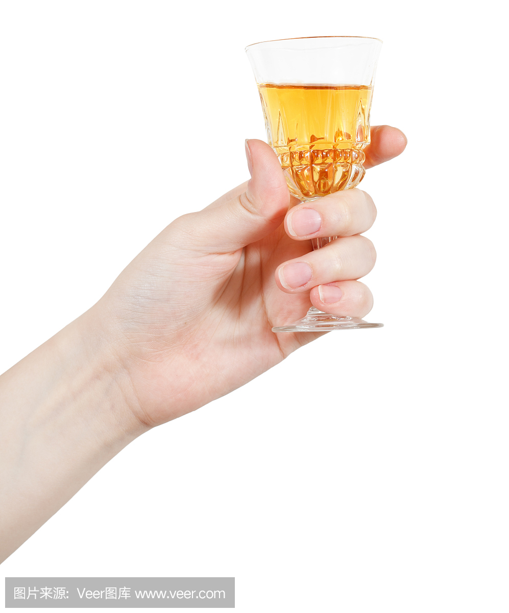 手拿着一点点甜点酒