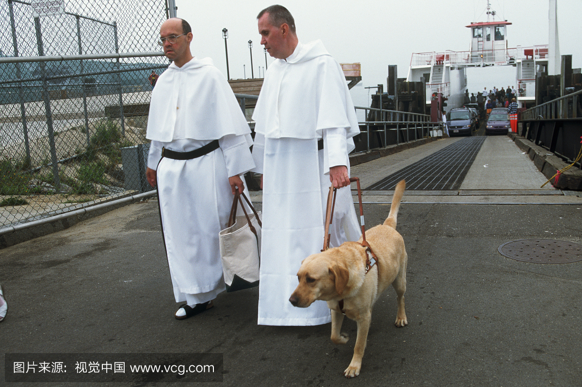Monks With a Guide Dog