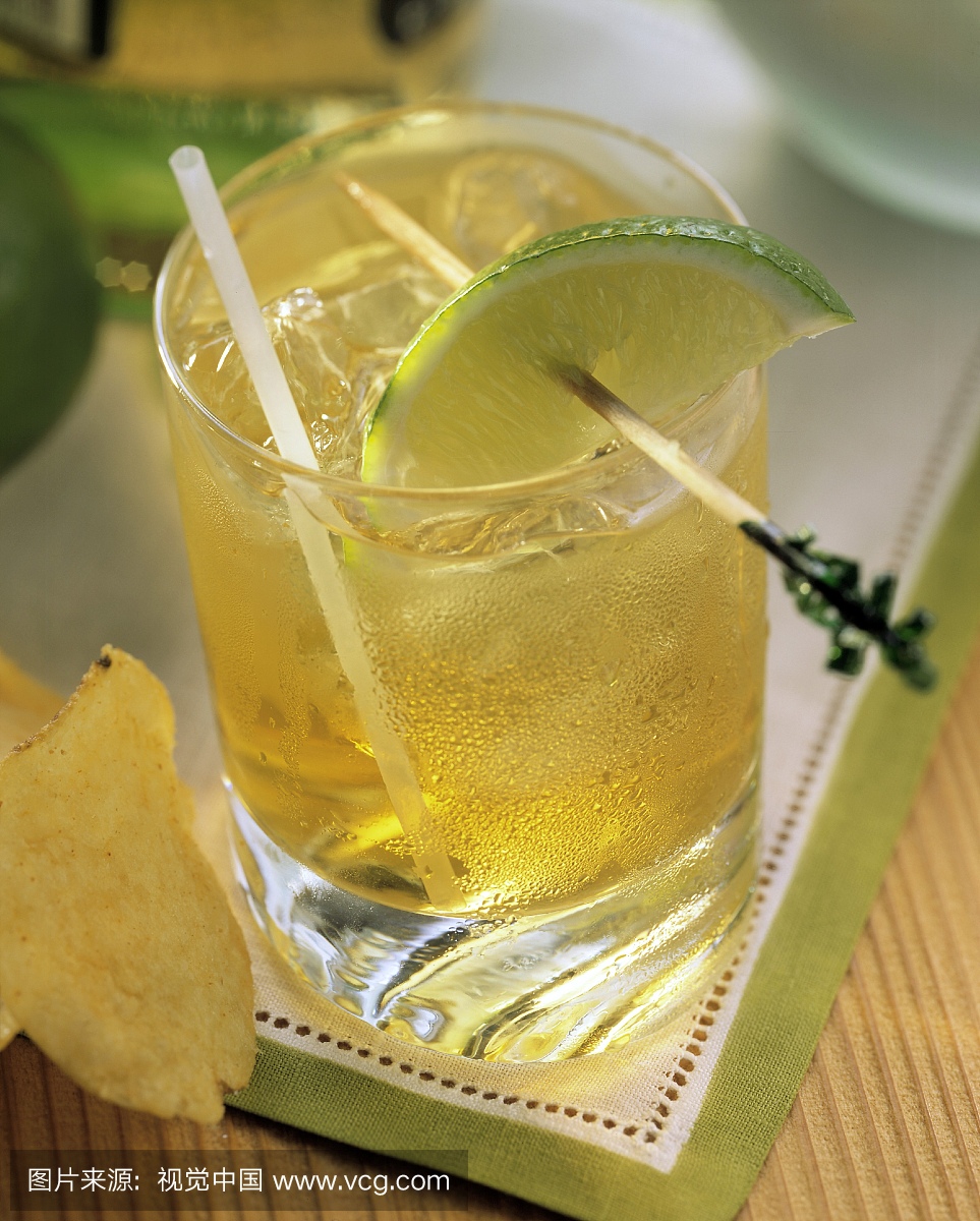 A Glass of Whisky and Ginger with a Lime Slice