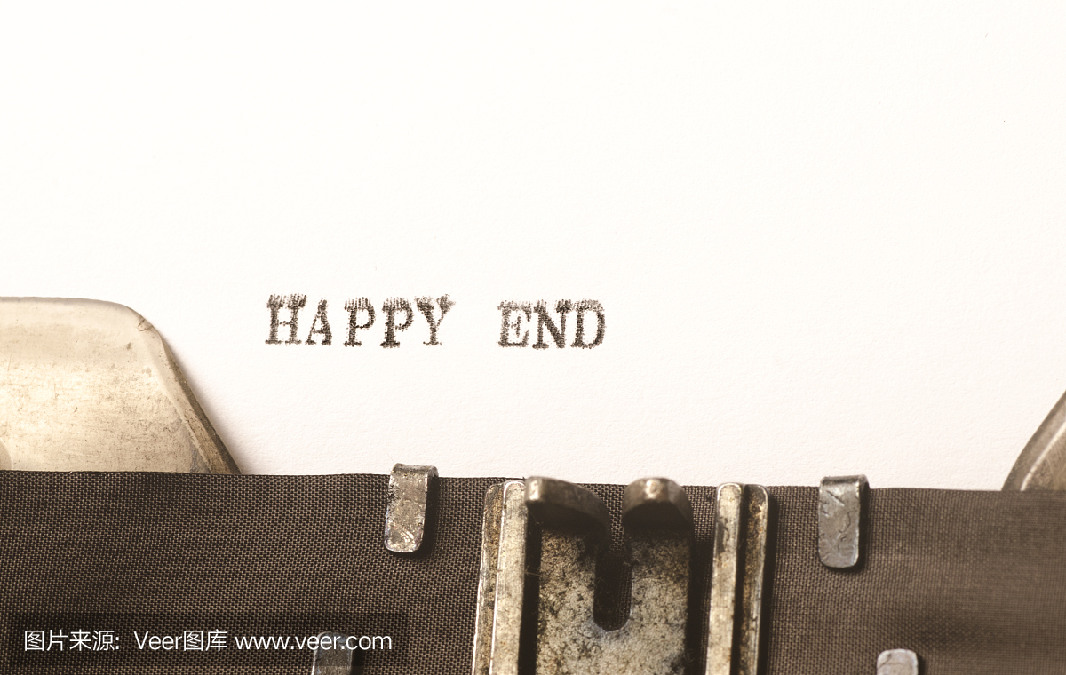 单词快乐结束写在打字机上